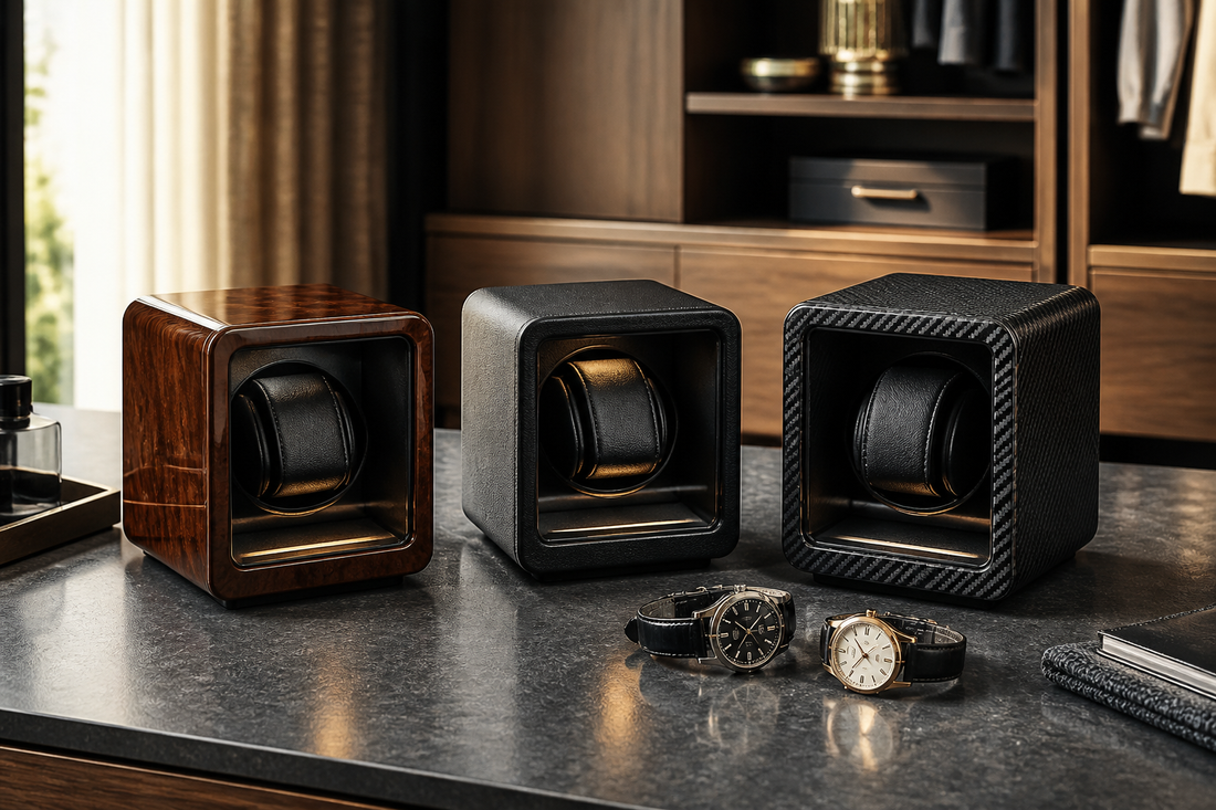 Wood, leather-look and carbon-fibre-style watch winders arranged on a UK dressing room surface